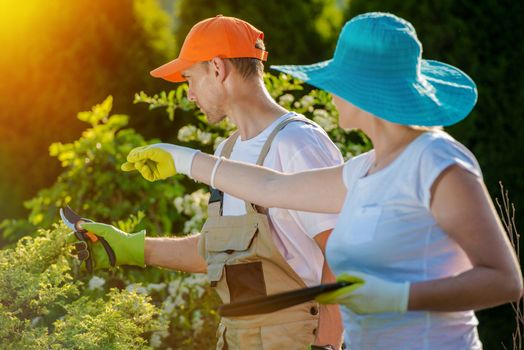 Couple and Their Garden Working to Expand the Garden Area and Taking Care of Plants.