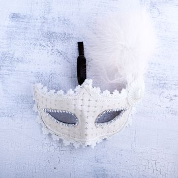 White carnival mask for Purim celebration. Jewish holidays