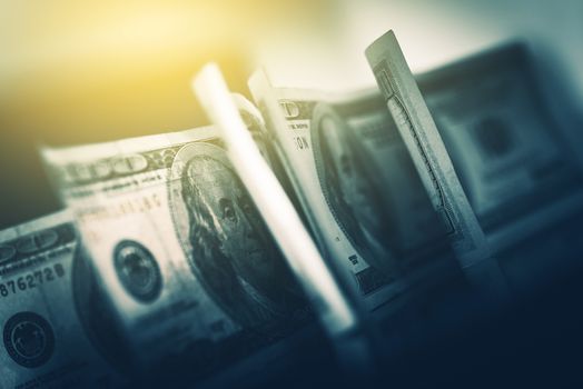 USD American Dollars in Focus. One Hundred American Dollars Banknotes Closeup Photo.