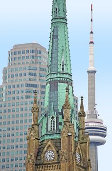 Toronto Canada - Ontario Province. Vertical Photography of Three Buildings. St. James Cathedral Church, Modern Commercial Skyscraper and Toronto CN Tower (Communication and Observation Tower) Three Great Toronto Symbols in the One Shot.