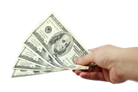 5 Hundred Dollars Giveaway. Five One Hundred Dollar Bills in a Hand. White Solid Background.