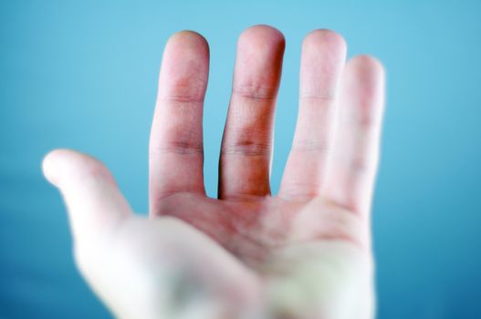 Open Male Hand - Cool Blue Background