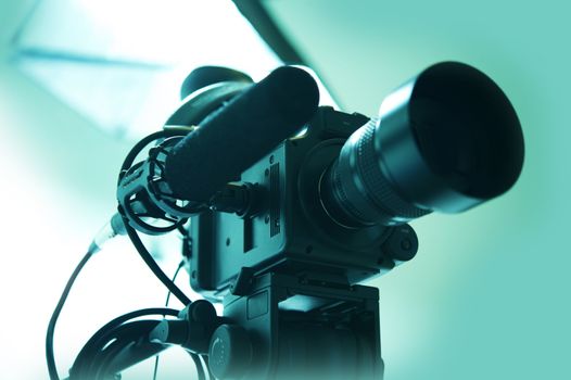 HD Video Camera with Shotgun Microphone. Video Production - Broadcast Theme.