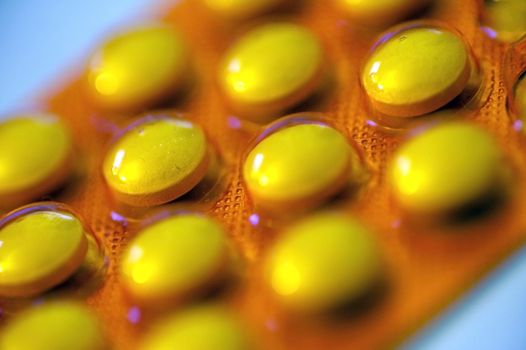 Orange Pills Macro Photo. Medications and Healthcare Photo Collection