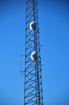GSM Tower on the Blue Sky. Cellular Tower with Antennas