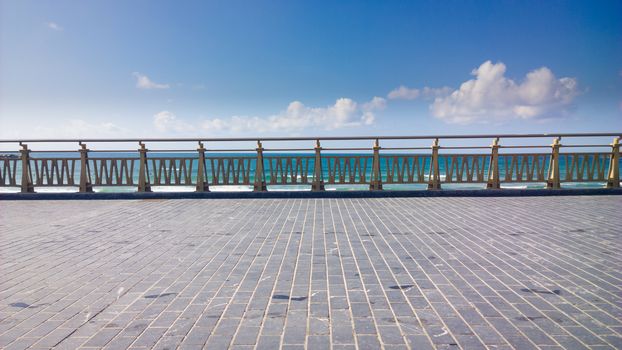 Promenade by the sea in summer