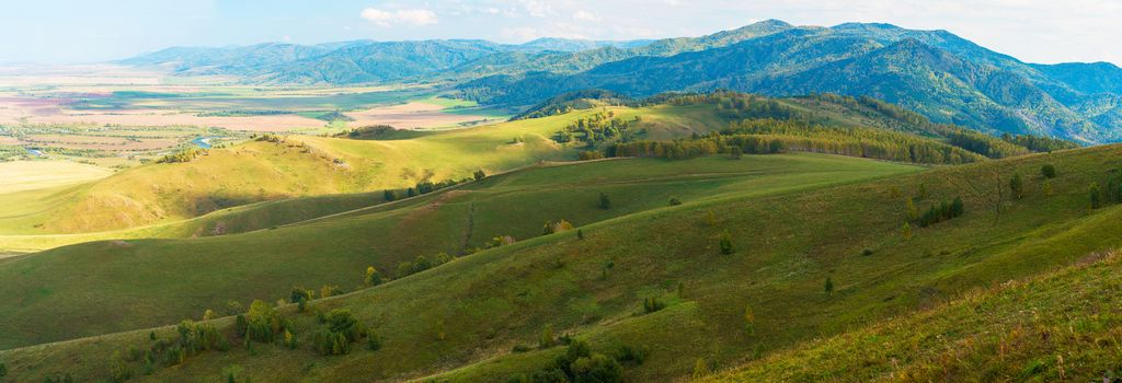 Beauty day in the mountains in Altay, panoramic picture