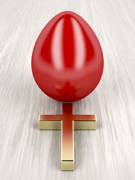 Easter decoration with red egg and golden cross