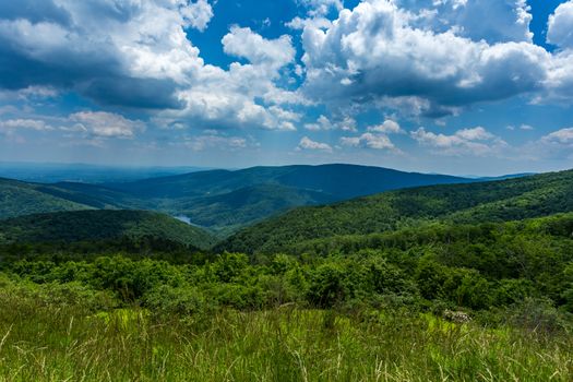 Rain falls in the distance over the Appalchian Mountains at Shenandoah National Park.