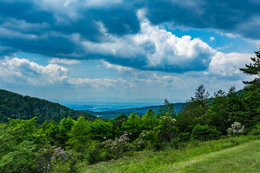 Rain falls in the distance over the Appalchian Mountains at Shenandoah National Park.