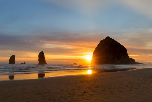 Haystack Rock and the Needles at Cannon Beach on the Oregon Coast during Sunset
