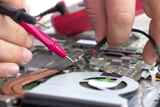 Broken computer repair with the instrument.Laptop Disassembling