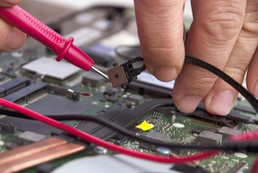 Broken computer repair with the instrument.Laptop Disassembling