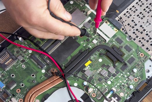 Broken computer repair with the instrument.Laptop Disassembling