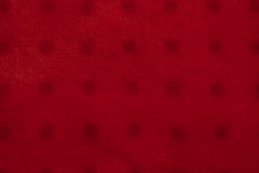 Close up of red colored textile texture for background