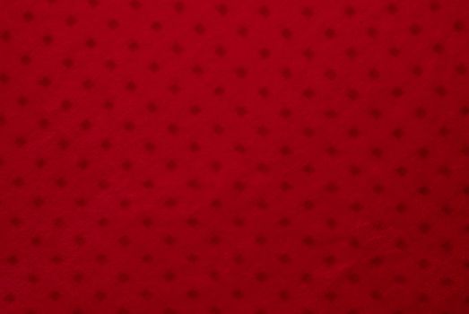 Close up of red colored textile texture for background