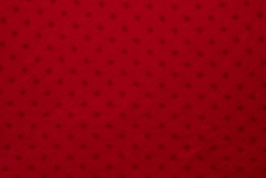 Close up of red colored textile texture for background