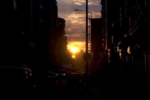 Evening traffic in the crowded city of the evening, beautiful sunset view.