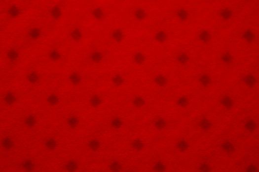 Close up of red colored textile texture for background