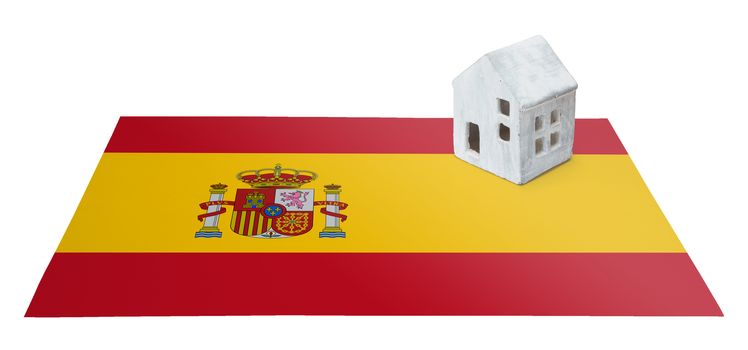 Small house on a flag - Living or migrating to Spain