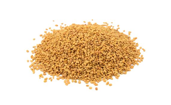 Dried fenugreek seeds, isolated on a white background