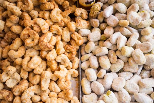 Background of typical sicilian cookies,pastries, made with  almond paste for sale in italian market.