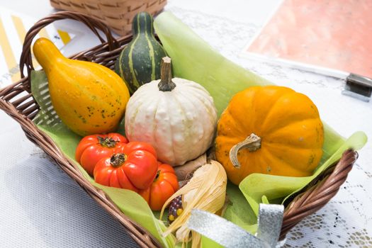 Halloween pumpkins in wooden basket