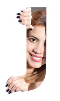 girl hiding behind and holding the letter "J"