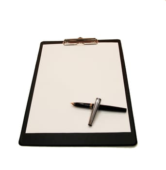 A white sheet of paper with a pen mounted on a black folder