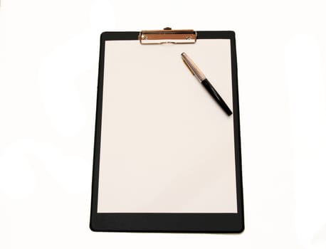 A white sheet of paper with a pen mounted on a black folder
