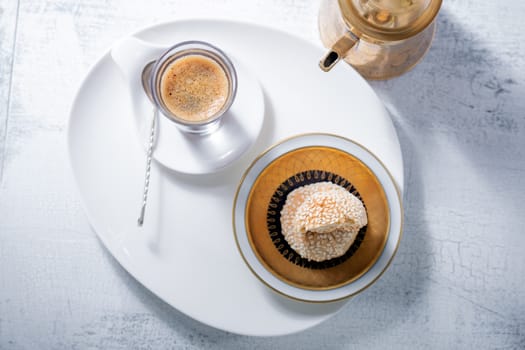 Coffee and handmade almond cookies on the table