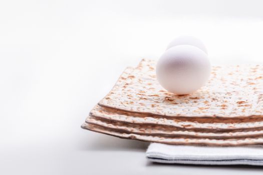 Matza and Eggs on the table. Jewish celebration passover