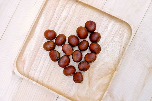 Chestnut in dish Wooden on the Table