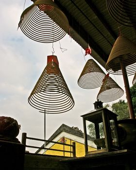 Many incense coil in temple