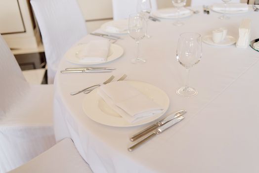 Empty cutlery on the table. Table setting