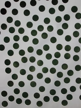 Grey Metal Plate Background with Random Drilled Holes