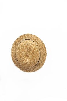 Straw hat-boat isolated on white background, close-up.