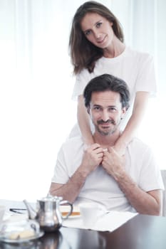 Couple having breakfast together at home 