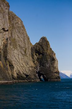 An interesting rock formation juts out of the ocean near Seward, Alaska. 