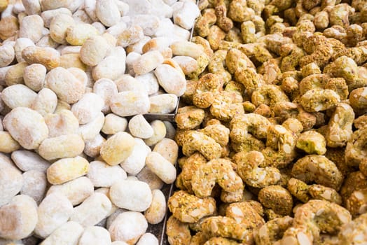 Background of typical sicilian cookies,pastries, made with  almond paste for sale in italian market.