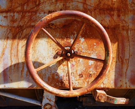 old rusty valve on a train, industrial background                               