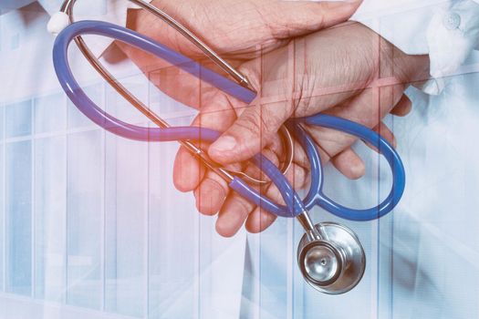 male doctor holds stethoscope for a fever at the hospital.