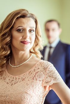 Close up portrait of happy husband and wife after the ceremony in a registry office in Lviv, Ukraine