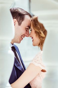 Portrait of happy man and woman at the registry office after the ceremony in Lviv, Ukraine