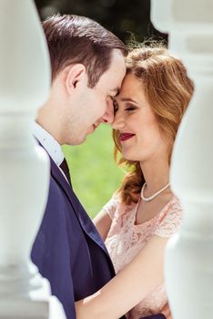 Portrait of happy man and woman at the registry office after the ceremony in Lviv, Ukraine