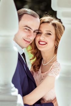 Portrait of happy man and woman at the registry office after the ceremony in Lviv, Ukraine