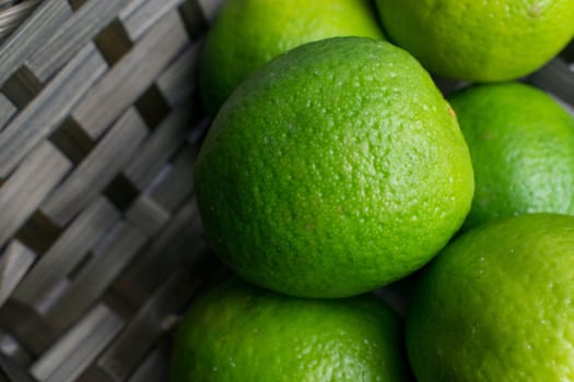 Group of limes in a wooden background