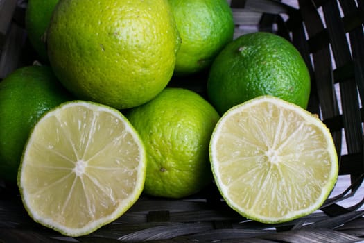 Group of limes in a wooden background