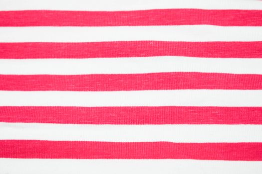 Red colored lines of a textile material as cotton