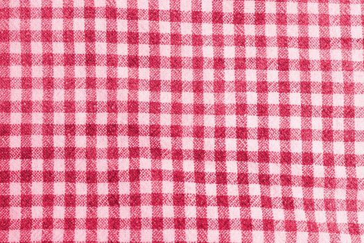 A red colored texture of a cotton textile